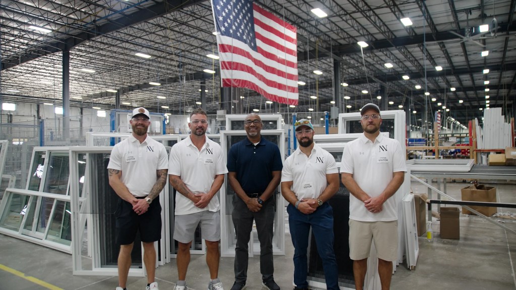 Front page 4 window Contractor in white shirt